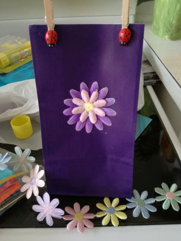 Bedazzling bags (rainy day crafts)